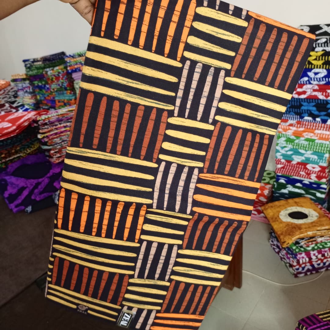 ZEAL 100% COTON WAX NIGERIAN batik noir orange jaune  à motif tressage tissé  